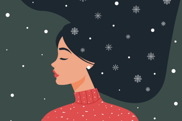 Na grafice kobieta z rozpuszczonymi włosami w zimę